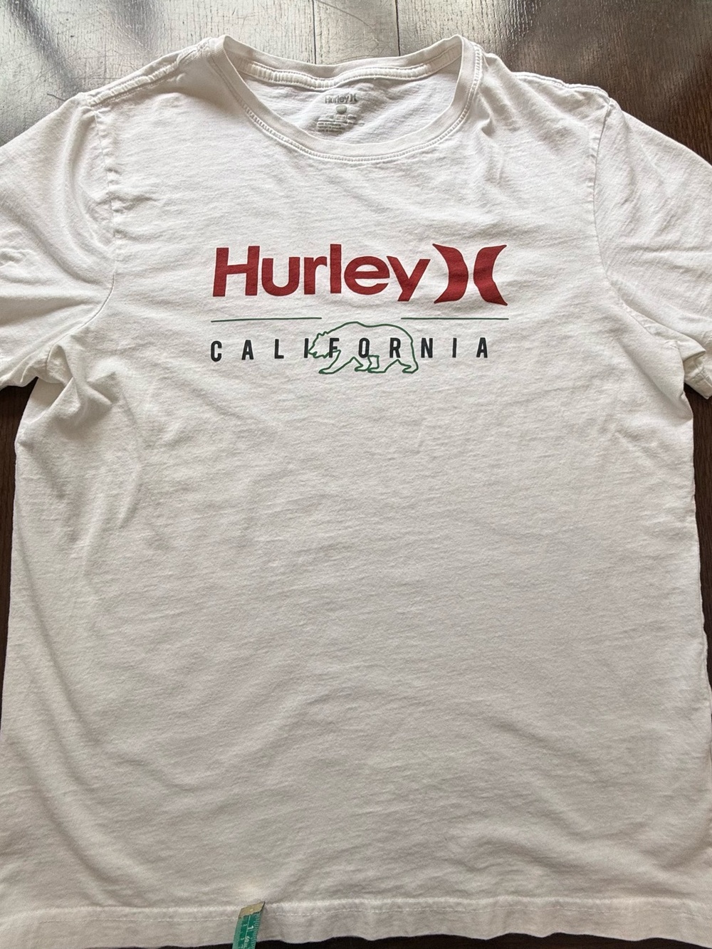 Hurley White Short Sleeve Tee with Red Logo and Green Graphic